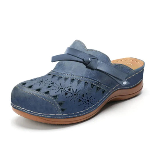 Image of Lola | Women's Bow Accent Cutout Slip-On Clogs